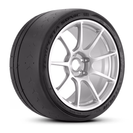 Car tire mounted on a silver alloy wheel, shown at an angle to reveal tread and rim details.