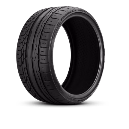 Close-up of a black tire with visible tread patterns and the sidewall text 'FORMULA SPEC'.